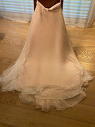 Whimsical boho romantic wedding skirt by Petra Kara Bridal in sizes S to XXXXL, featuring flowing fabric and delicate details.