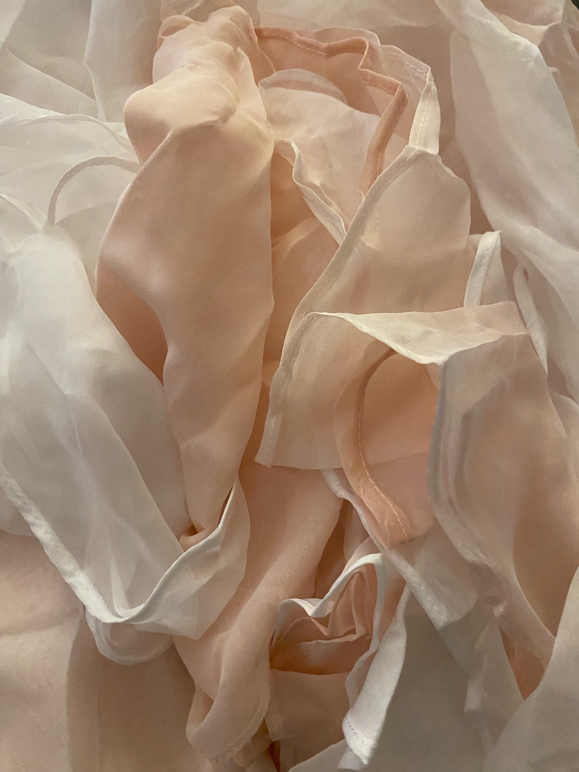 Whimsical boho romantic wedding skirt by PETRA KARA BRIDAL, flowing fabric with delicate lace and floral details for a dreamy bridal look.