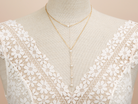 Elegant bridal layered Y necklace by PM Atelier featuring double-layered freshwater pearls for a sophisticated wedding look.