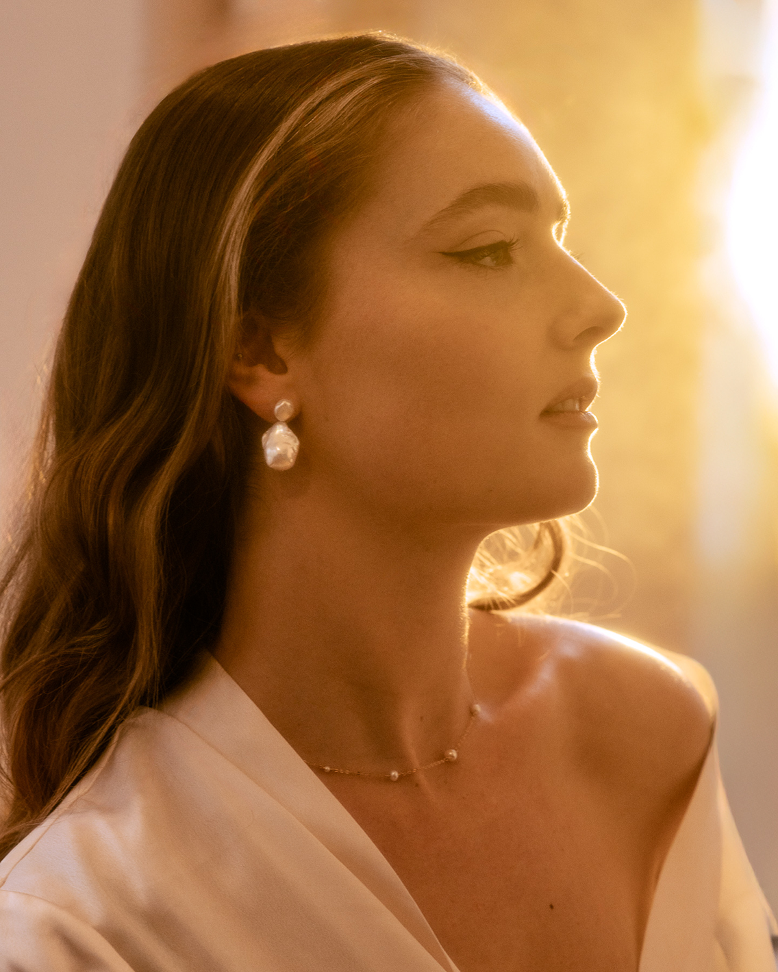 Adelaide Baroque Pearl Earrings by PM Atelier featuring unique, irregular freshwater pearls with elegant gold settings