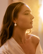 Adelaide Baroque Pearl Earrings by PM Atelier featuring unique, irregular freshwater pearls with elegant gold settings