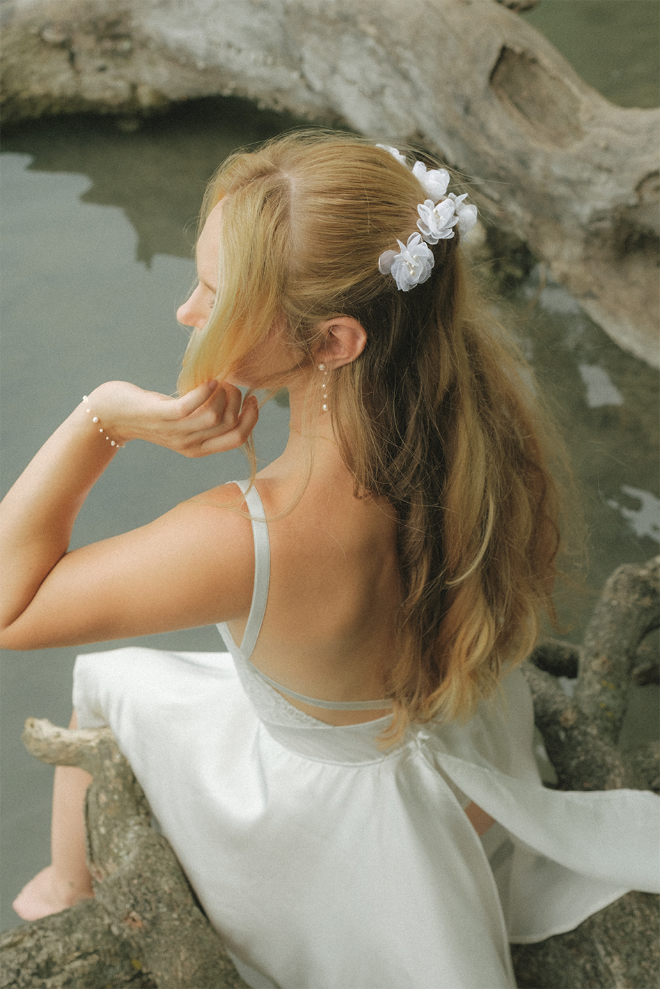 Sheer flower bridal hair pin from PM Atelier with delicate floral design, perfect for wedding hair accessories.