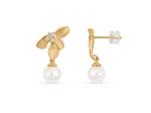 Small floral earrings by PM Atelier featuring freshwater pearl pendants and gold-tone accents, perfect for elegant everyday wear.