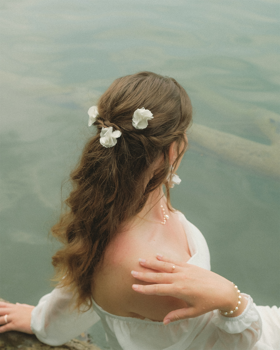 Adrielle luxury silk flower bridal hair pin by PM Atelier, elegant floral hair accessory for wedding hairstyles.