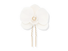 Bridal white gold orchid hair pin by PM Atelier, elegant statement accessory for bride's hairstyle.